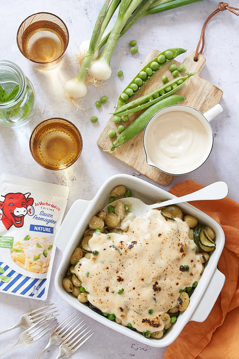 Gratin de gnocchis petits pois, courgettes, oignons nouveaux sauce fromagère nature La Vache qui rit