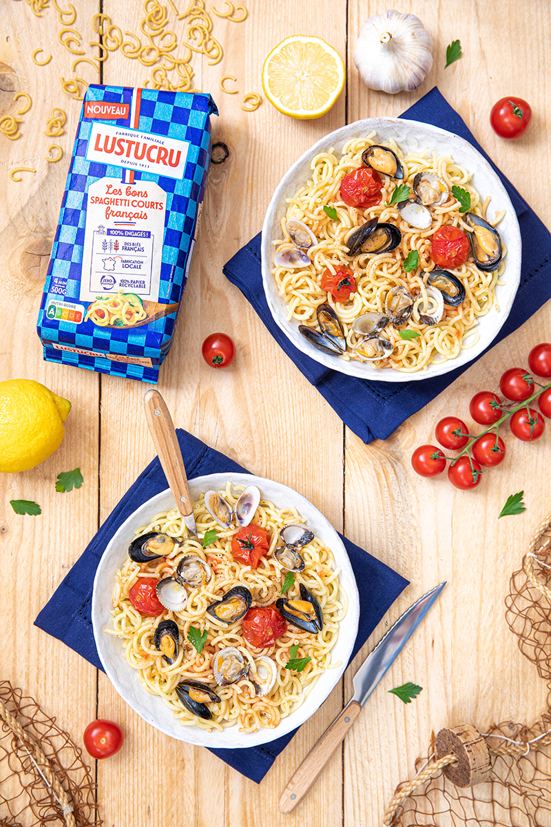 Les bons Spaghetti courts coquillages tomates confites