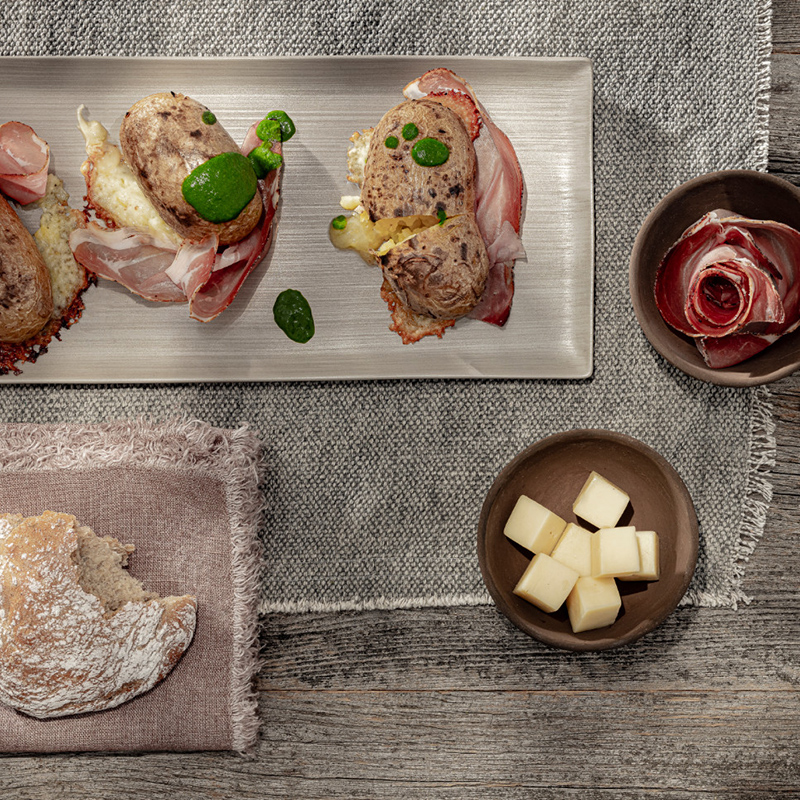 Pommes de terre farcies Speck Alto Adige IGP Fromage Stelvio AOP